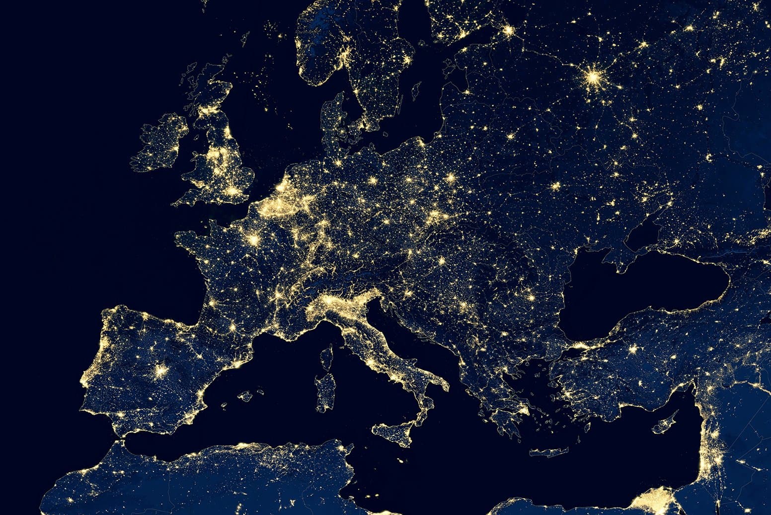 Europe in global satellite view at night, view of city lights Earth from space.