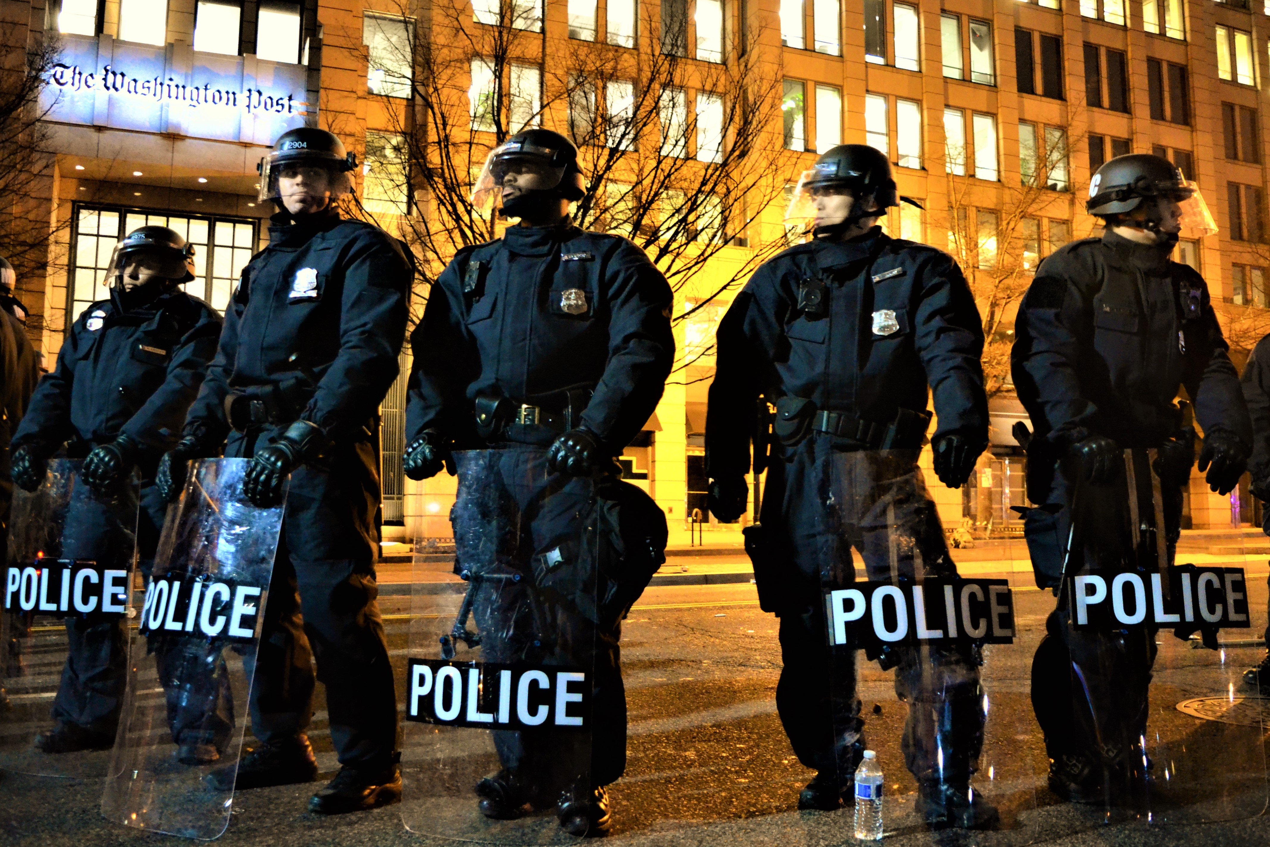 Metropolitan police in Washington, DC holding riot shields.