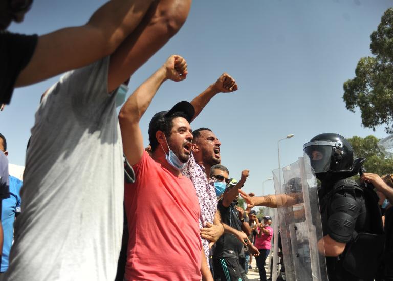 Protesters gathering in Tunis amid widespread anti-government demonstrations.